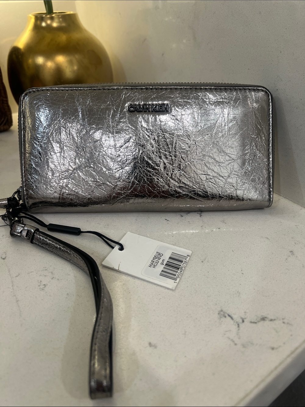 Calvin Klein Silver Metallic Wristlet / Wallet with Strap. NWT